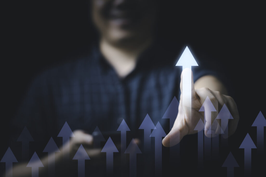 a businessman showing growth