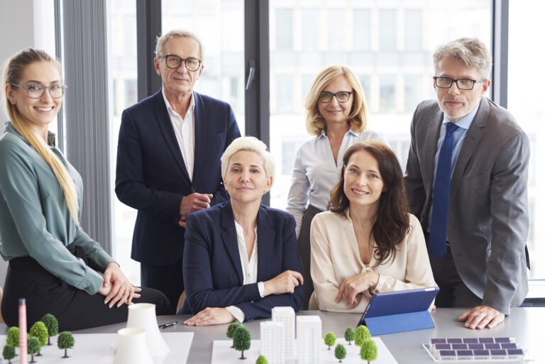 CEO laughing with his team