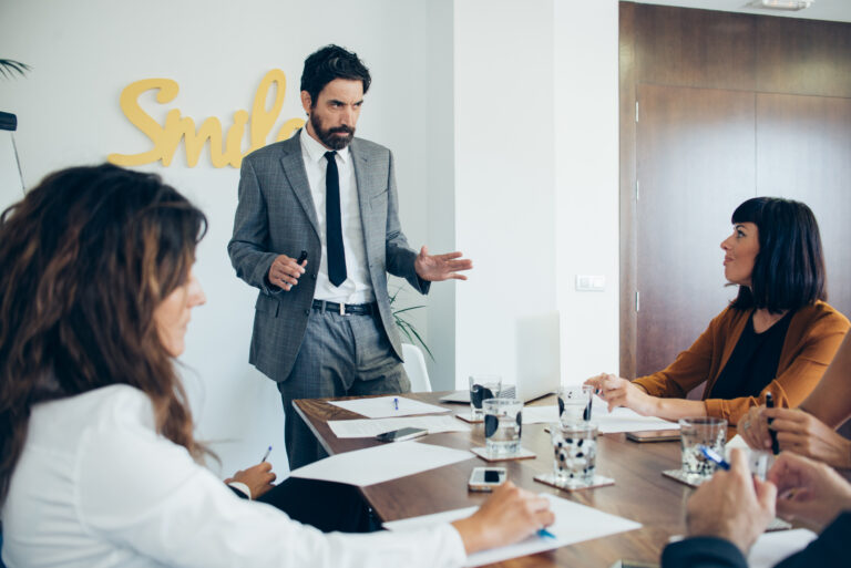 leader discussing new ideas with his team